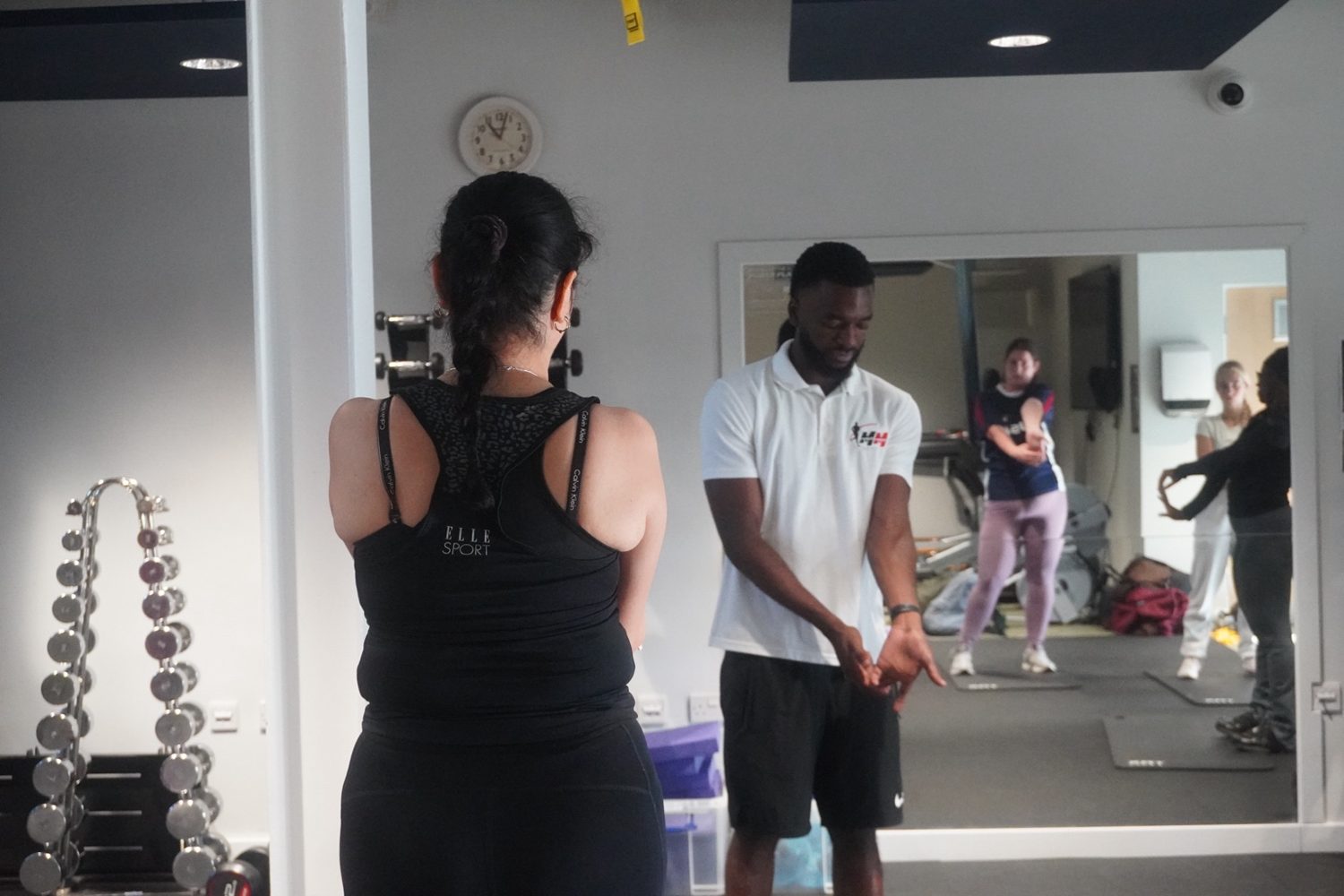 Coach leading a training session